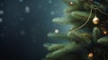 Green spruce branches with garland lights on a blurred blue evening background