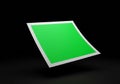 A green square floating against a dark background with a subtle drop shadow. The Royalty Free Stock Photo
