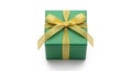 Green square gift box with a textured gold ribbon bow. The box has smooth surfaces Royalty Free Stock Photo