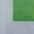 Green square on white background with little holes