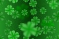 Green St. Patrick day seamless background with clover four-leaf blured leaves. Vector simple design Royalty Free Stock Photo