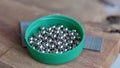 green and stainless round plastic bullets - okee Royalty Free Stock Photo