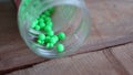 green and stainless round plastic bullets - okeeee Royalty Free Stock Photo