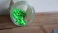 green and stainless round plastic bullets - yes Royalty Free Stock Photo