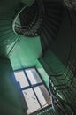 Green staircase with winding stairs, natural delicate light