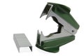 Green staple remover and staples Royalty Free Stock Photo