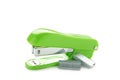 Green stapler  on a white background Royalty Free Stock Photo