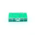 Green staples in box Royalty Free Stock Photo