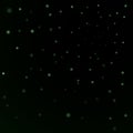 Green stars black night sky background. Abstract bokeh glowing space design. Starry milky way. Galaxy starlight shine