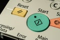 Green start button on Control panel of copier machine  macro shot Royalty Free Stock Photo