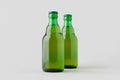 Green steinie beer bottle mockup on a grey background