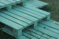 steps of wooden pallets on the grass