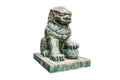 Green stone ancient chinese guardian lion statue isolated on white background. Royalty Free Stock Photo