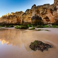 Green Stones at Porto de Mos Beach in Lagos, Algarve Royalty Free Stock Photo