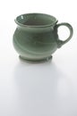 Green stoneware mug Royalty Free Stock Photo