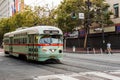 Green street car on its railway