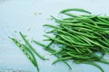 Green or string beans on blue vintage table top view. Organic and healthy food. Farmers autumn harvest.