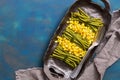 Green string beans and corn. Top view, blue background. Royalty Free Stock Photo