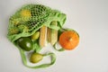 Green string eco shopping bag with vegatables avocado, corn, lemon and pumpkin Royalty Free Stock Photo