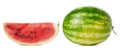 Green striped whole round watermelon and a piece with red pulp and brown seeds