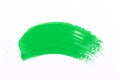 green stroke of the paint brush