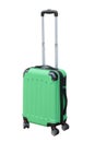 Green suitcase on wheels for travel Royalty Free Stock Photo