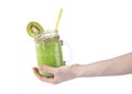Green summer smoothie in female hand isolated Royalty Free Stock Photo