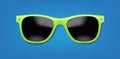 Green Sunglasses And Blue Background