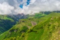 green surface of the high picturesque Caucasus Mountains