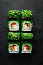 Green sushi. Japanese sushi with Chuka salad.