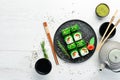 Green sushi. Japanese sushi with Chuka salad. Asian Diet Food.