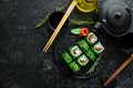 Green sushi. Japanese sushi with Chuka salad. Asian Diet Food.