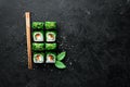 Green sushi. Japanese sushi with Chuka salad. Asian Diet Food.