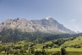 Green Swiss meadows and the North face of the Eiger mountain of the Bernese Alps, Grindelwald, Switzerland Royalty Free Stock Photo