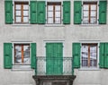 Green Swiss Window Shutter and Window Pane