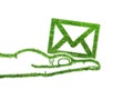 Green symbol email in the hand Royalty Free Stock Photo