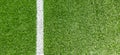 Green synthetic grass soccer sports field with white corner stripe line Royalty Free Stock Photo
