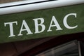 green tabacco store front with french text tabac, the Royalty Free Stock Photo