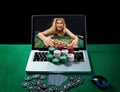 Green table with casino chips and cards on notebook Royalty Free Stock Photo