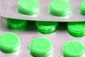 Green tablets in blister. medical drugs