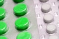 Green tablets in blister. medical drugs