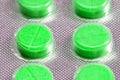 Green tablets in blister. medical drugs