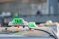 Green taxi sign in Paris, France Royalty Free Stock Photo