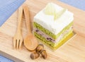 Green tea cake on wooden background, tasty cake Royalty Free Stock Photo
