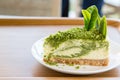 Green tea cheese cake on white dish Royalty Free Stock Photo