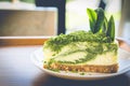 Green tea cheese cake on white dish Royalty Free Stock Photo