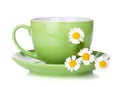 Green tea cup with camomiles Royalty Free Stock Photo