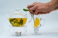 Green tea in glass teapot Royalty Free Stock Photo