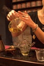 Green tea, glass teapot with tea leaves, tea is poured into a cup at a tea ceremony Royalty Free Stock Photo