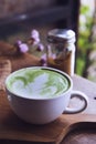 Green tea hot drink latte white cup on wood table aroma relax ti Royalty Free Stock Photo